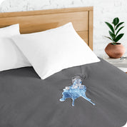 A glass of water spilled on a mattress protector