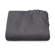 A mattress protector folded neatly