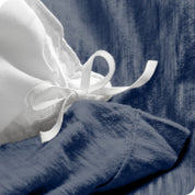 The corner ties used to attach the duvet cover to the insert.