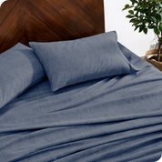 A close up view of a flannel sheet set on a modern bed.