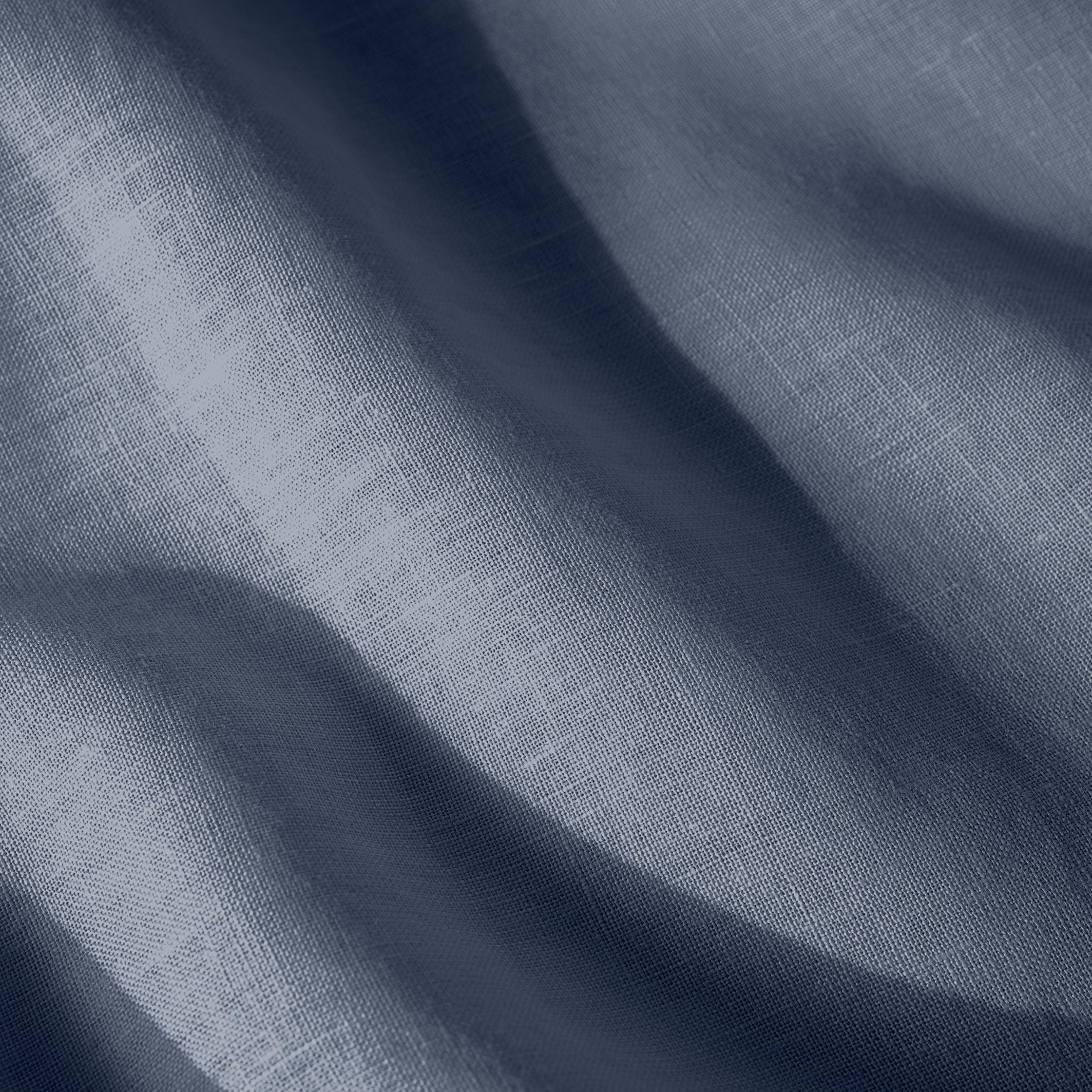 Close in view showing texture of linen sheet set fabric