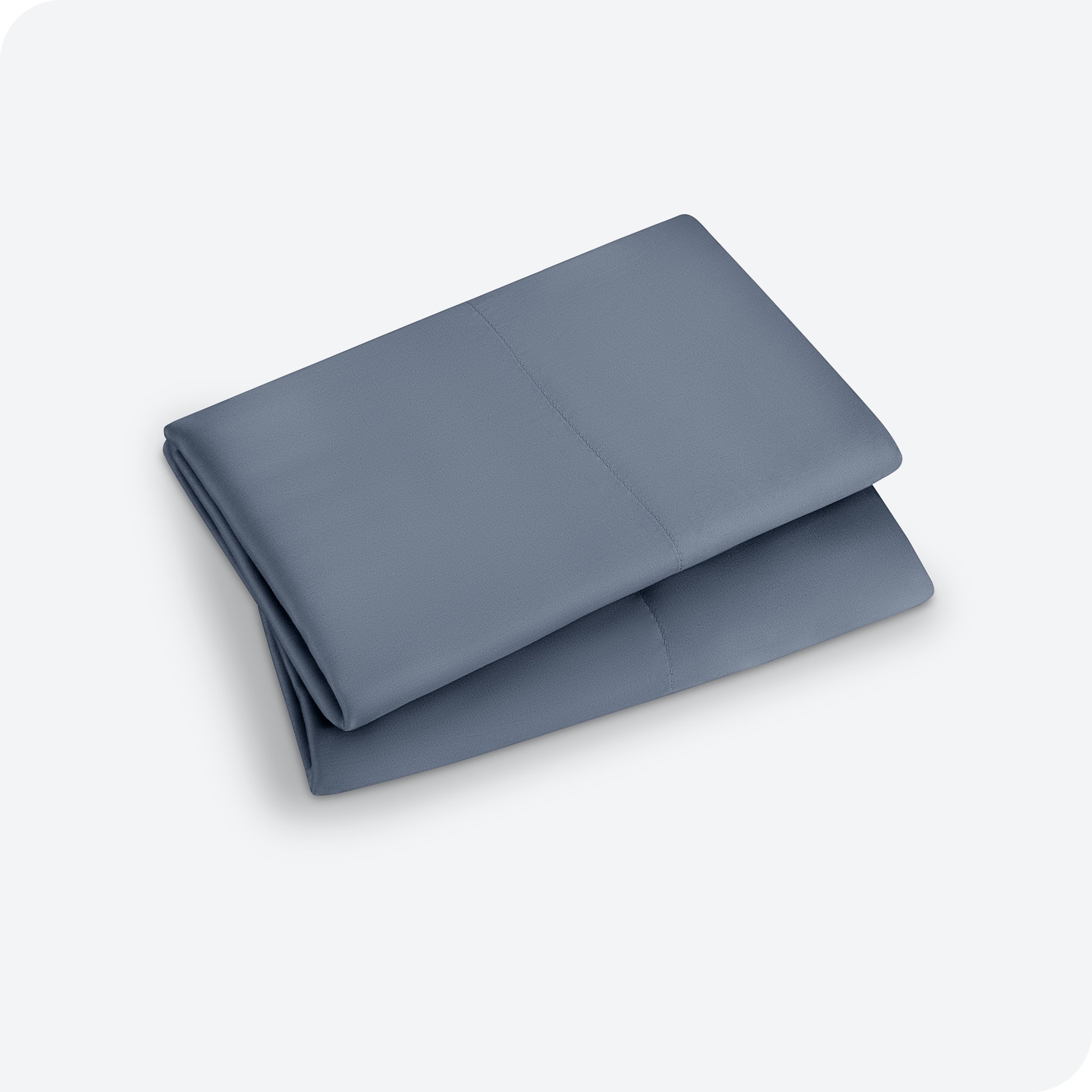 Two pillowcases folded and stacked neatly