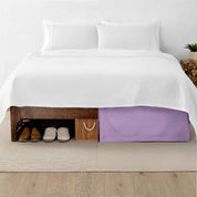 A split image showing a bed without a bed skirt on the left and with a bed skirt on the right.