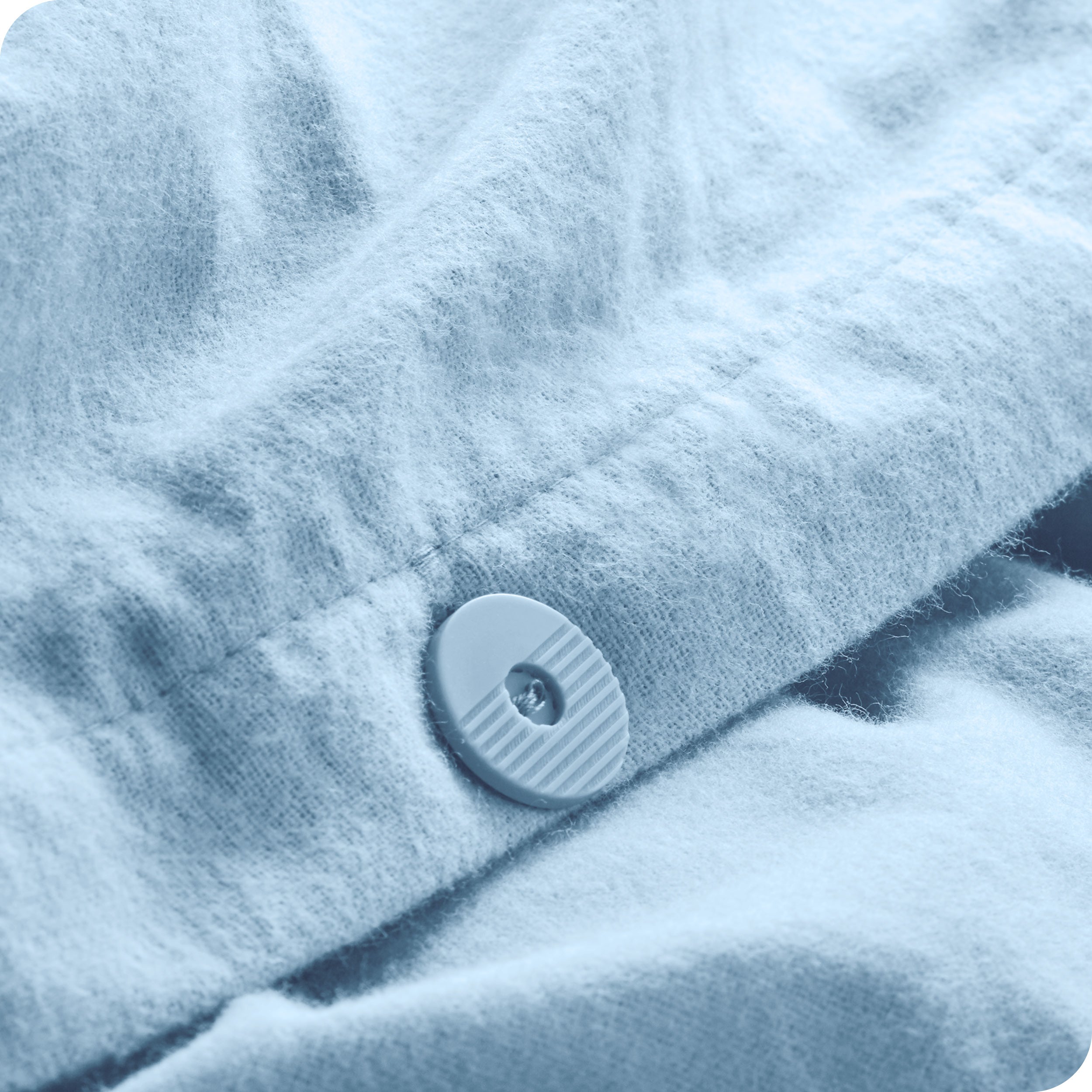 A close up of the tie corner of the duvet cover.