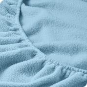 A close view of a polar fleece fitted pocket showing the texture.