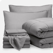 A bed in a bag folded and stacked neatly