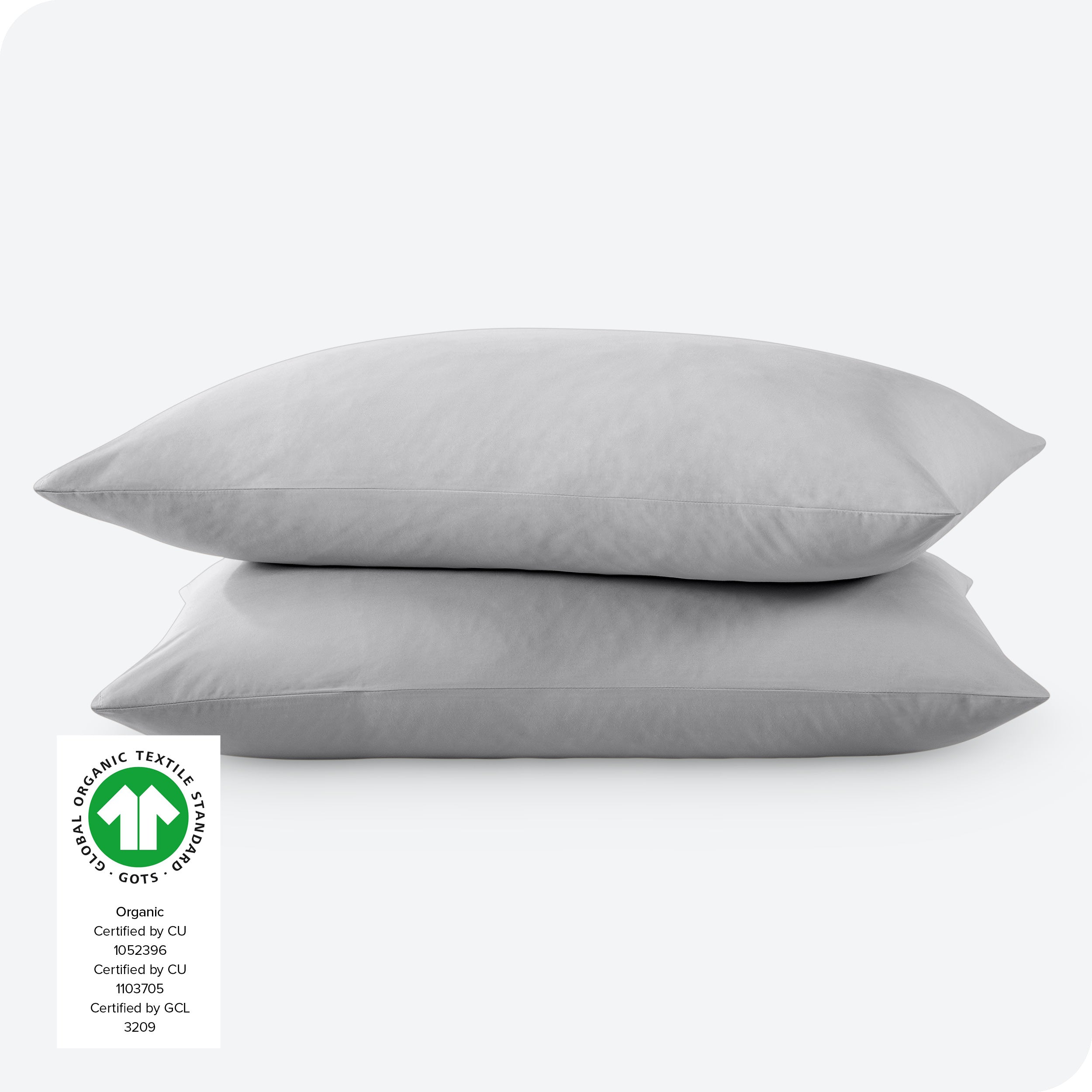 2 percale pillowcases on pillows set on a white background