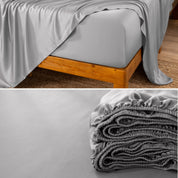 Bamboo fitted sheet on a wooden bed with a close-up of the folded sheet below.