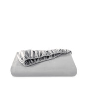 Fitted sheet neatly folded on a white background