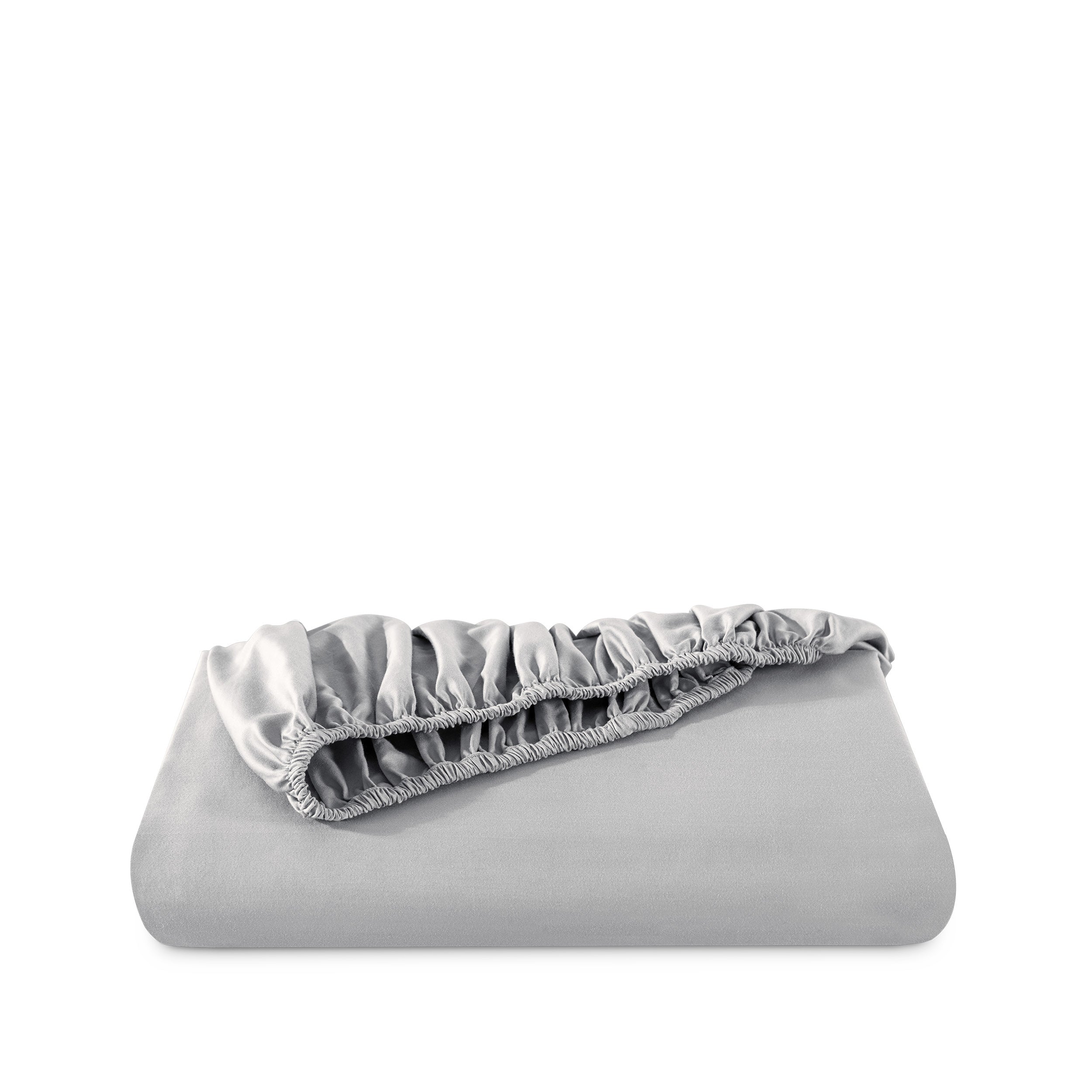 Fitted sheet neatly folded on a white background