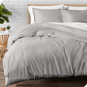 A modern bed with a flannel duvet cover set consisting of the duvet cover and two pillows.