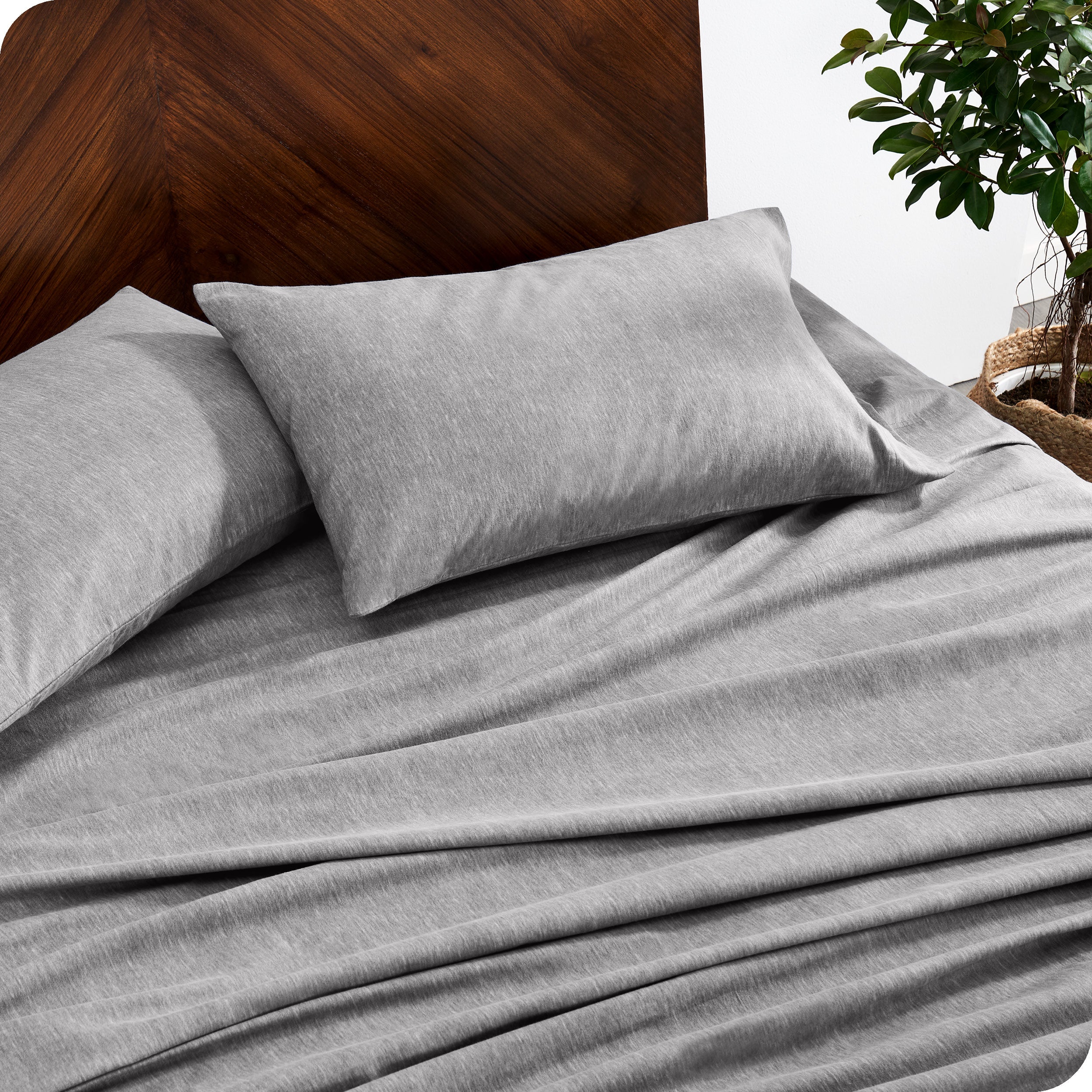 A close up view of a flannel sheet set on a modern bed.