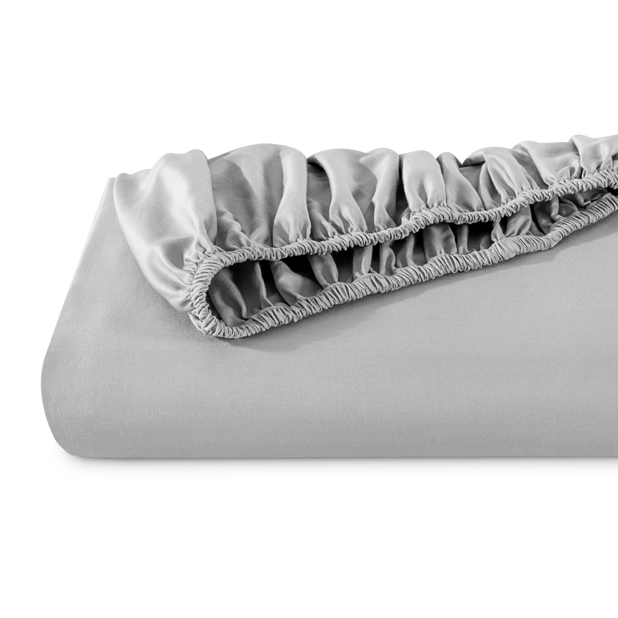 A single fitted sheet folded neatly showing part of the elastic