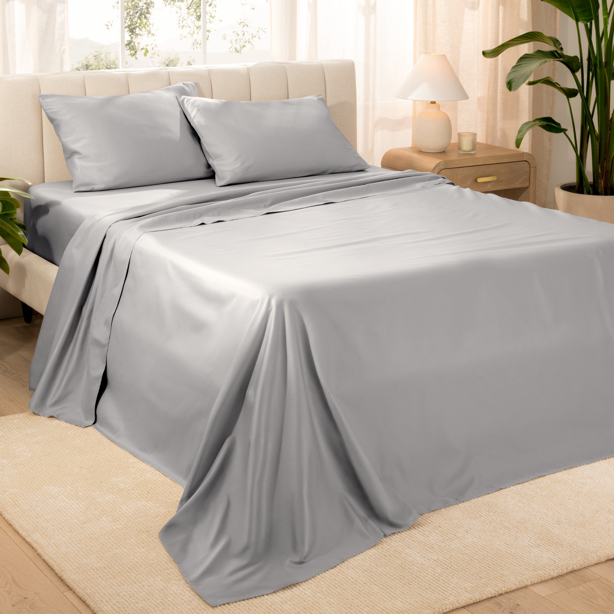 Diagonal view of a decorated room scene with sateen sheets