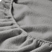 A close view of a polar fleece fitted pocket showing the texture.