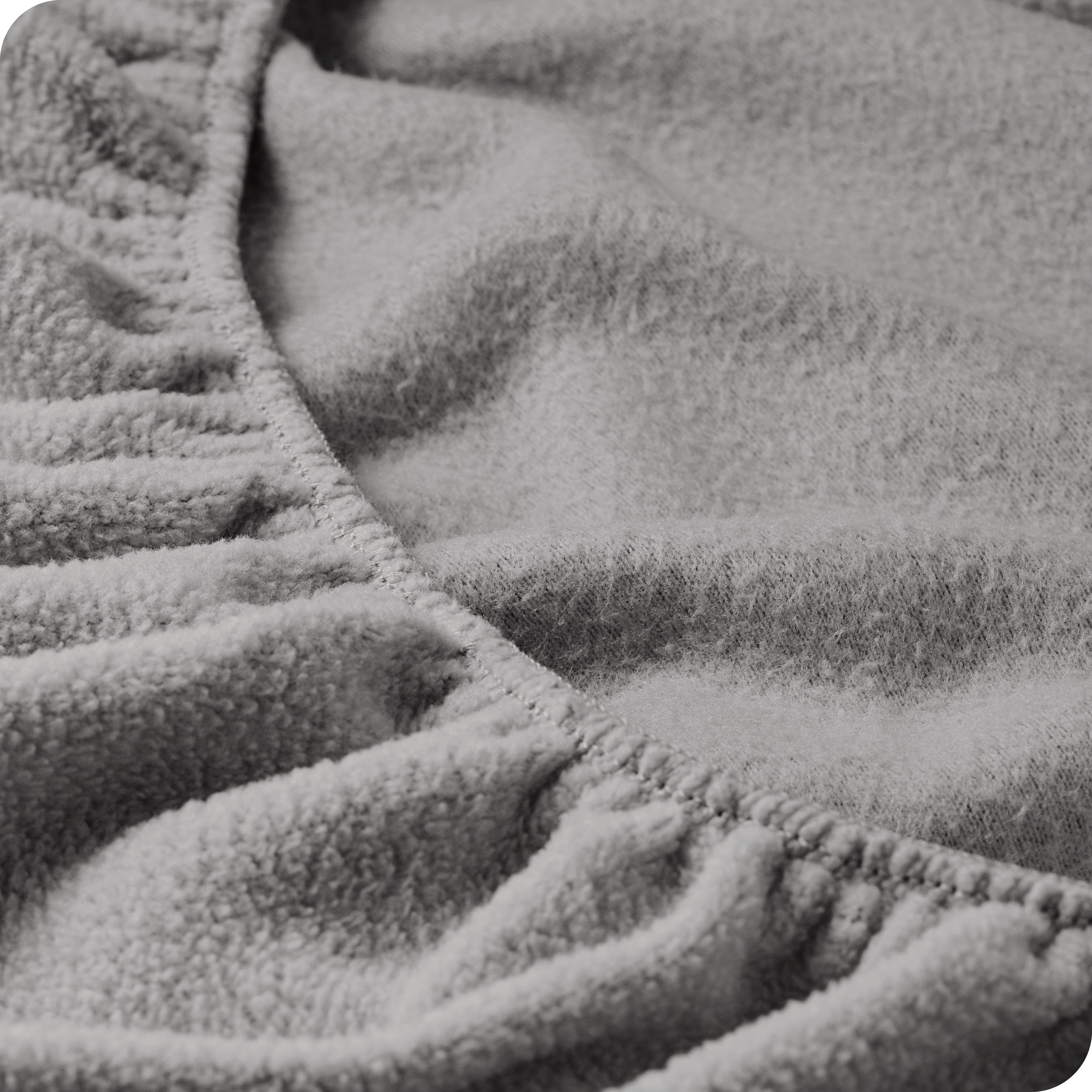 A close view of a polar fleece fitted pocket showing the texture.