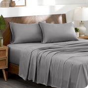 TENCEL™ pillowcases on pillows near a wooden headboard