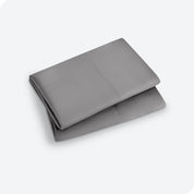 Two pillowcases folded and stacked neatly