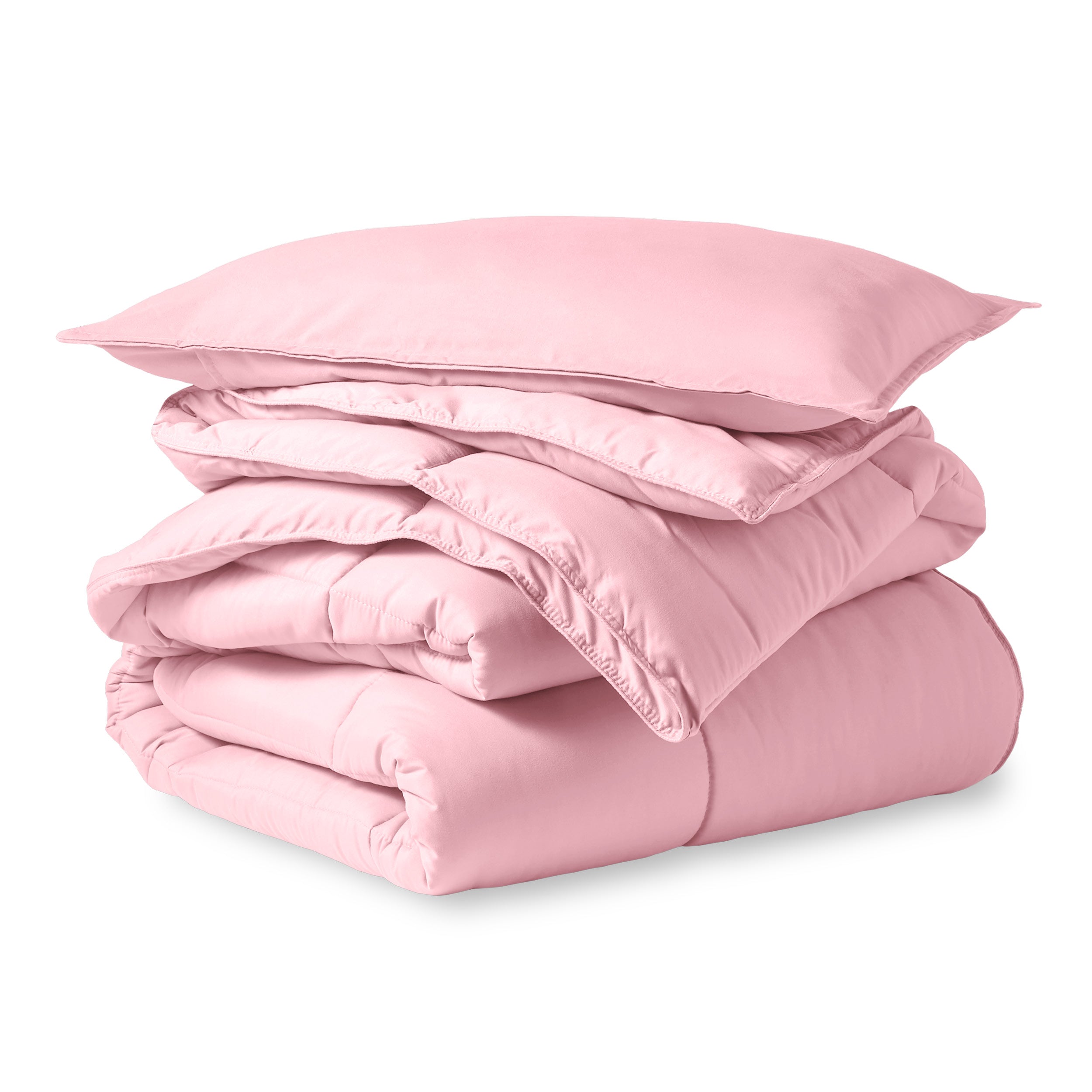 A microfiber comforter folded neatly with a pillow from above