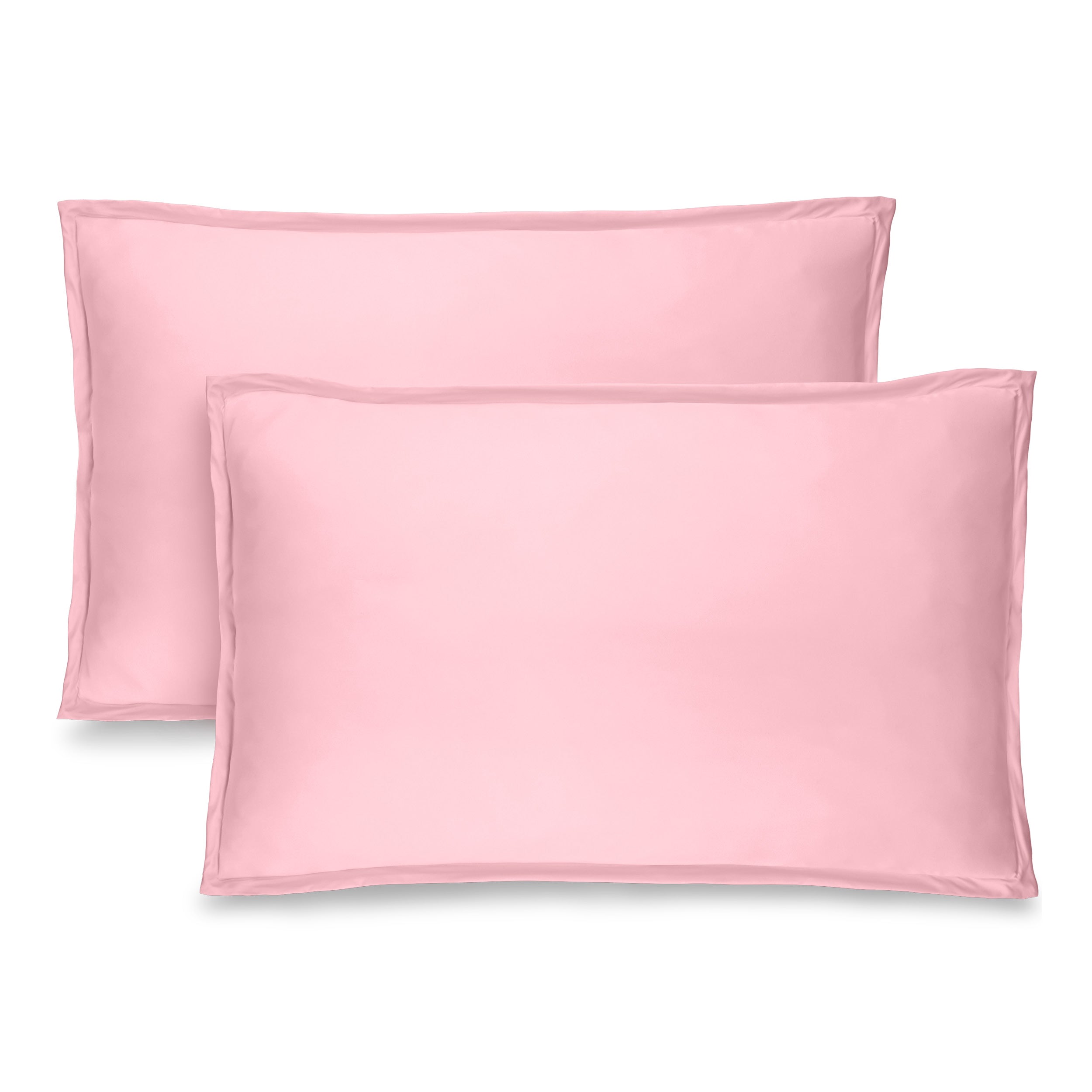 Two pillow shams on pillows standing up with one behind the other