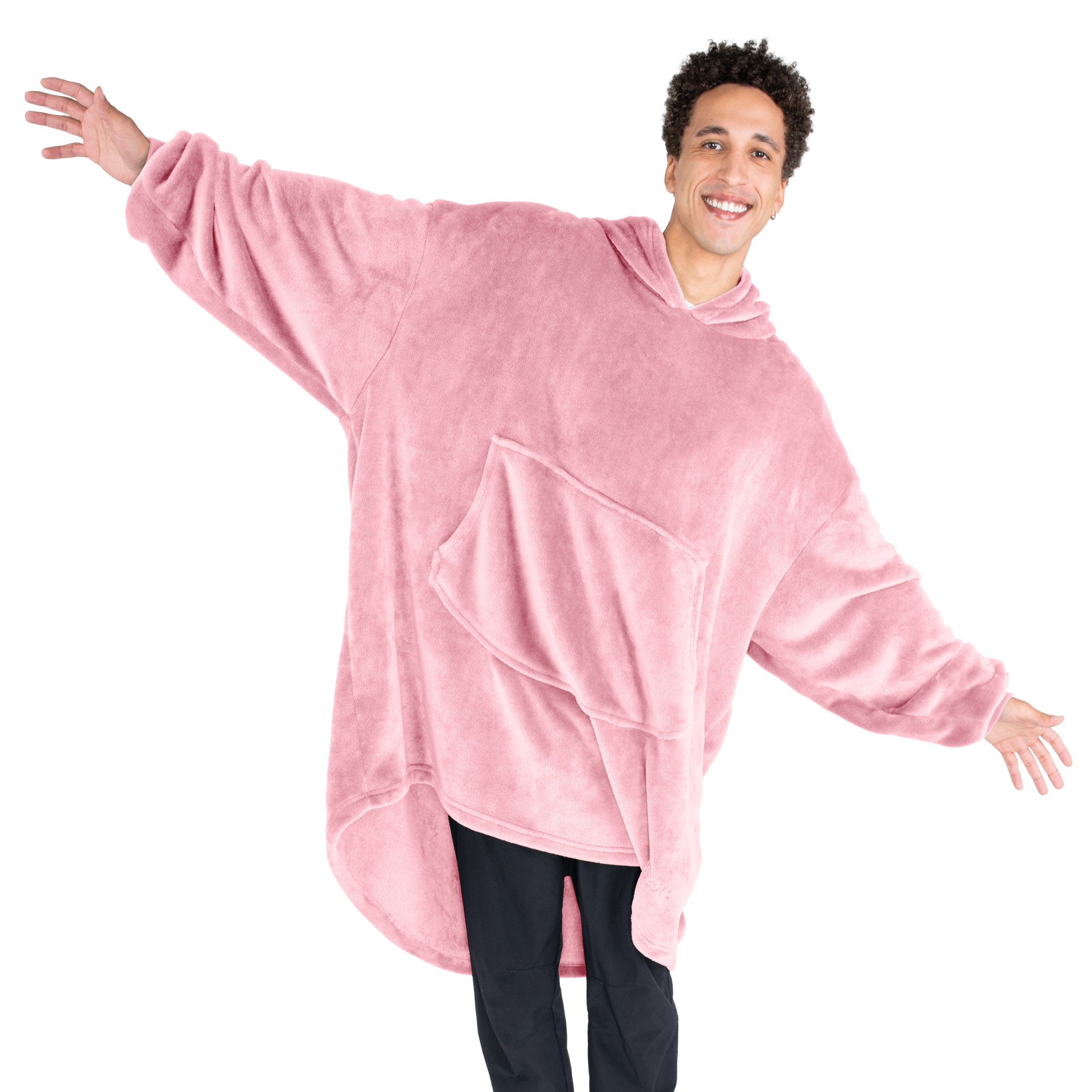 An adult with microplush wearable blanket on