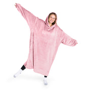 A woman has a hooded wearable blanket on