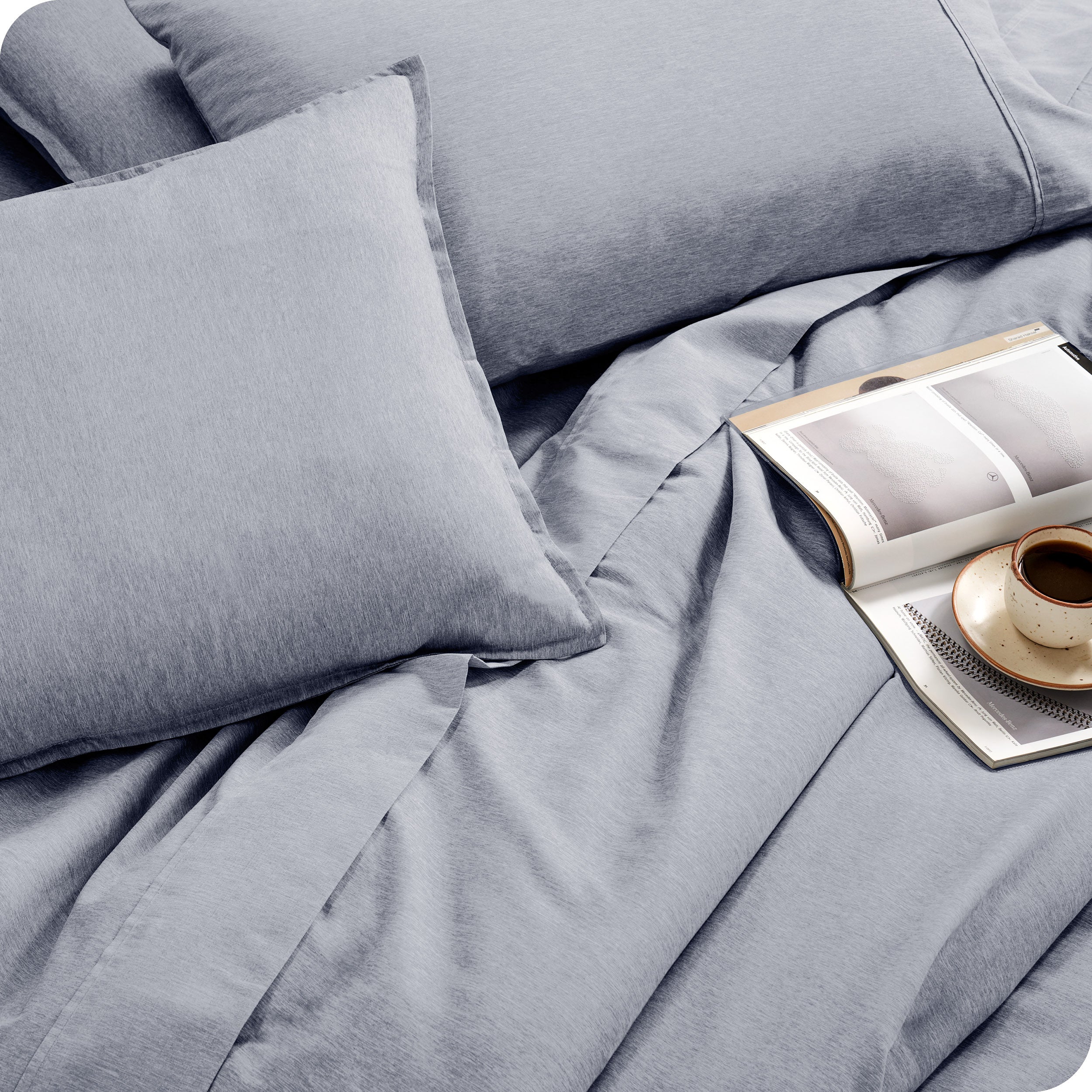 Close of matching sheets, comforter, pillowcases and pillow shams on a bed