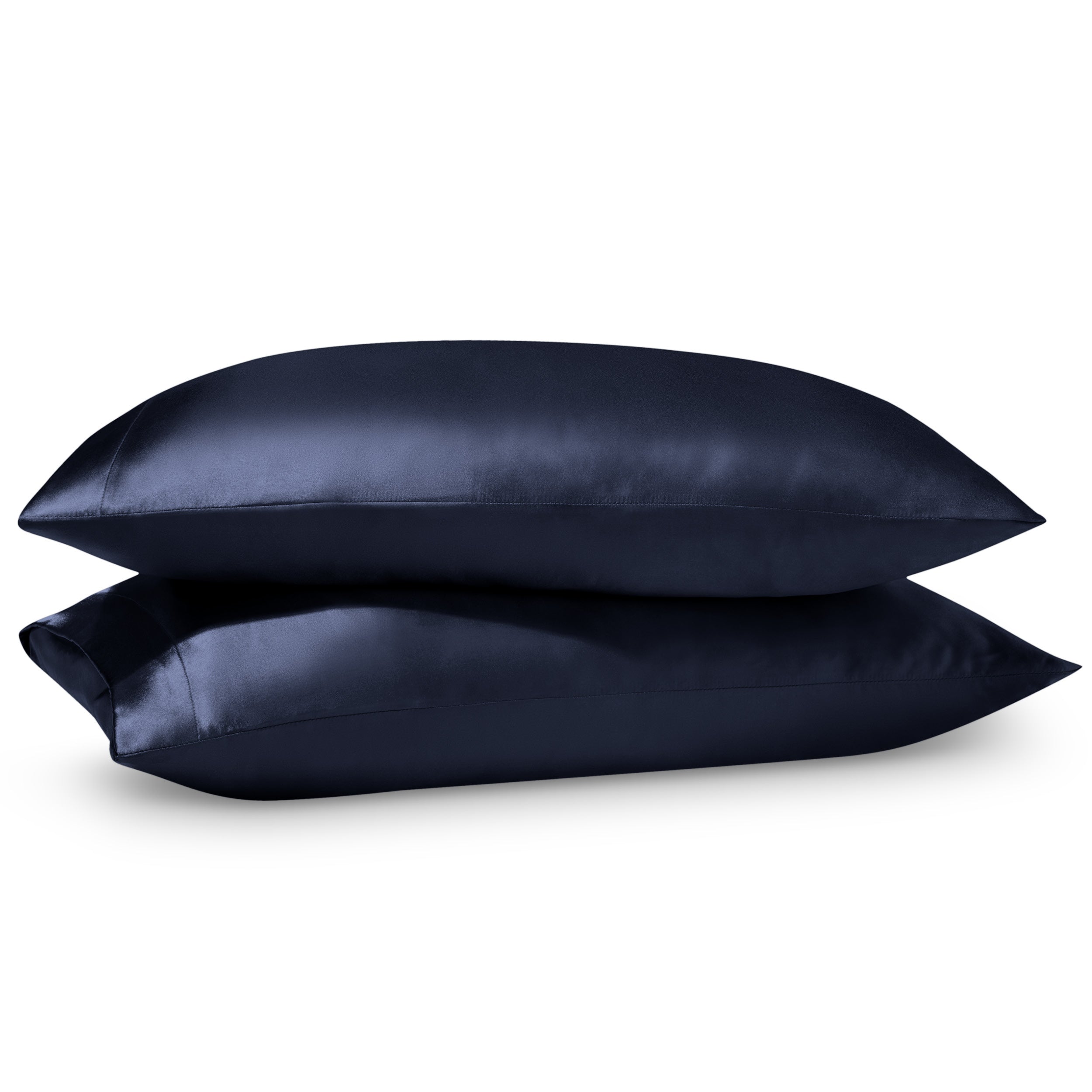 Two pillows on a white background with satin pillowcases on them.
