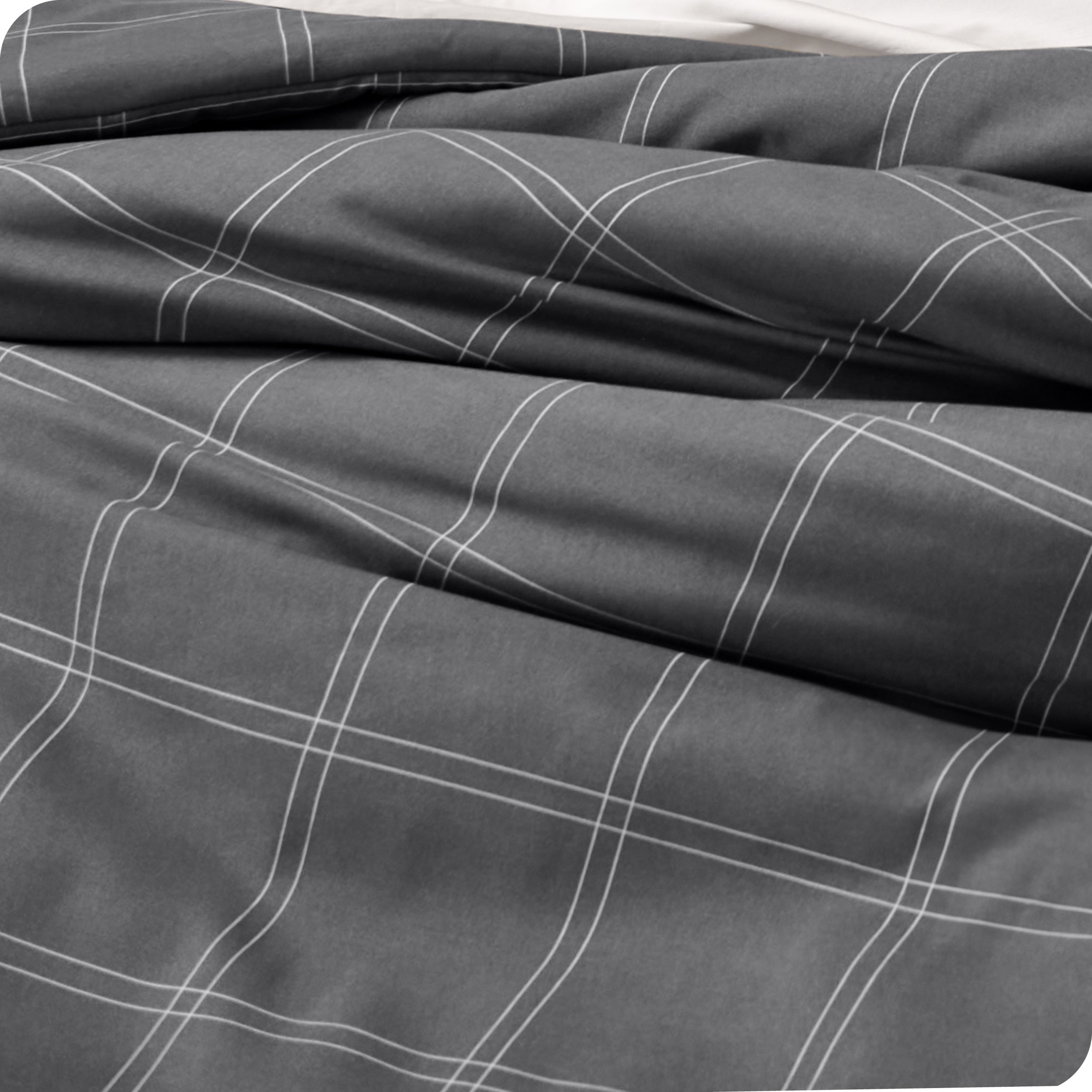 A close up of a track stitch comforter