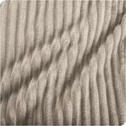 Close up of a ribbed microplush blanket showing the texture
