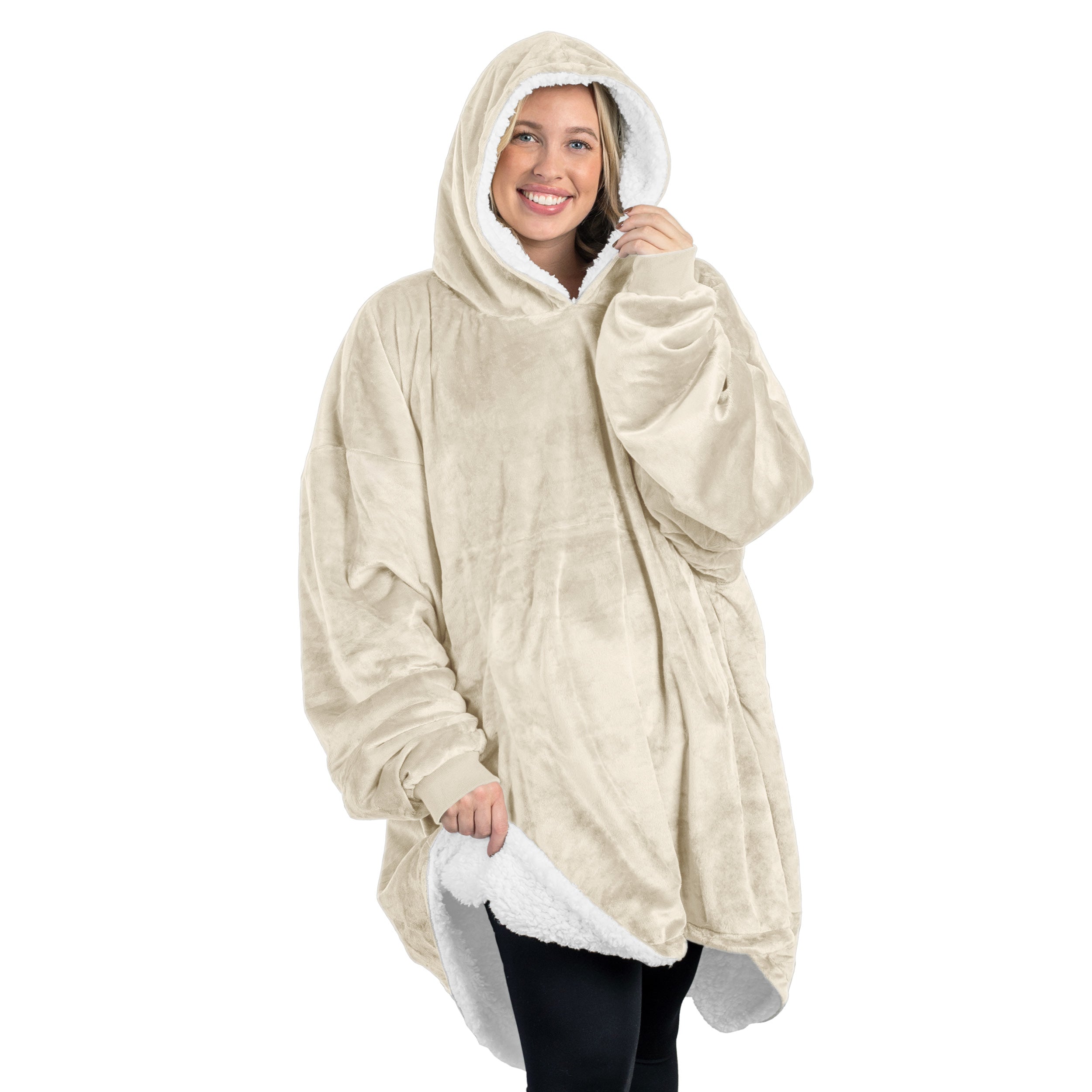 An adult with a sherpa wearable blanket on