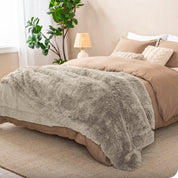 Close up of the soft texture of a shaggy faux fur sherpa blanket