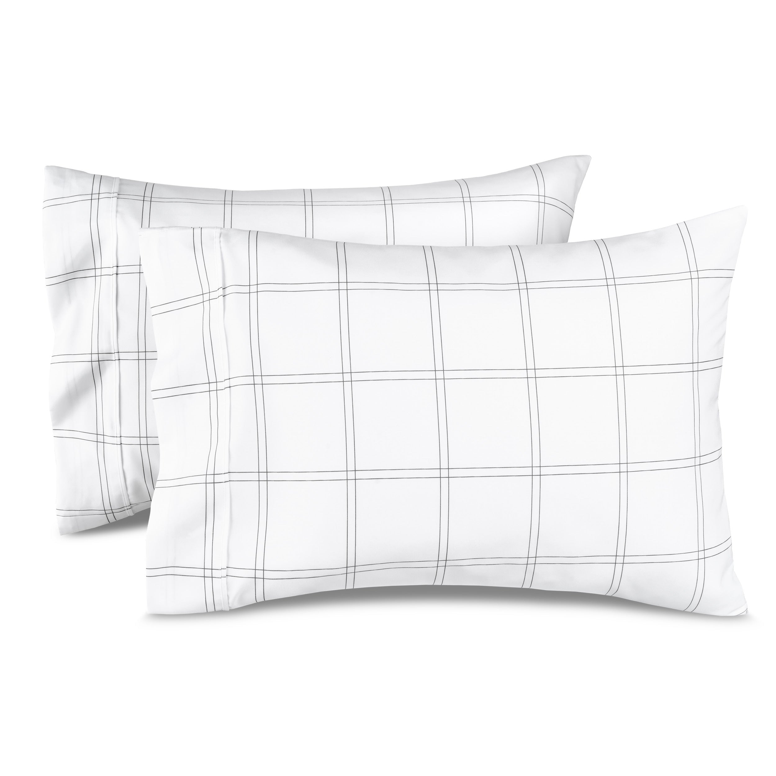 Two pillowcases on a white background with print pillowcases on them.