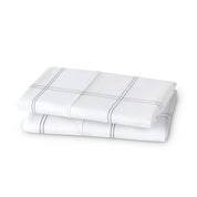 Two printed pillowcases folded and stacked