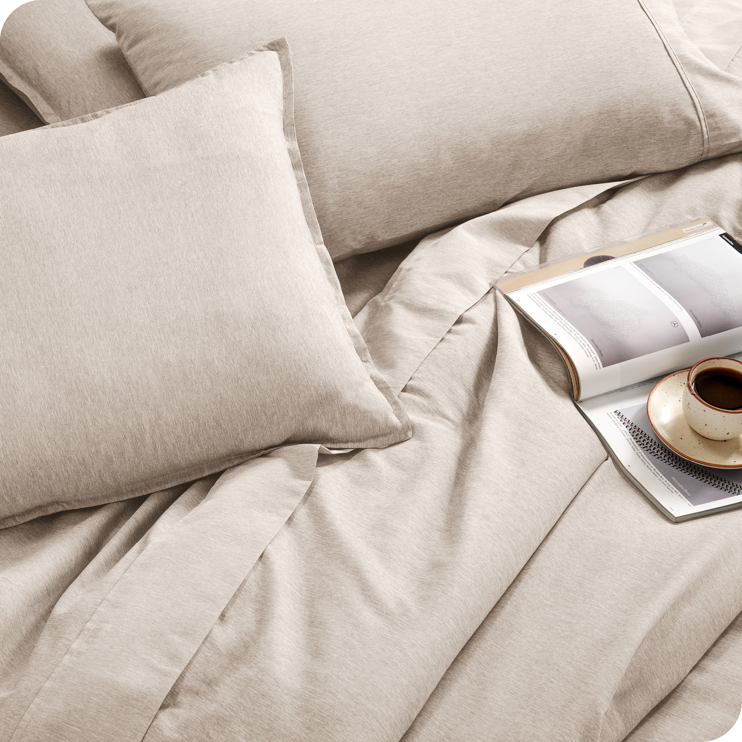 Close of matching sheets, comforter, pillowcases and pillow shams on a bed