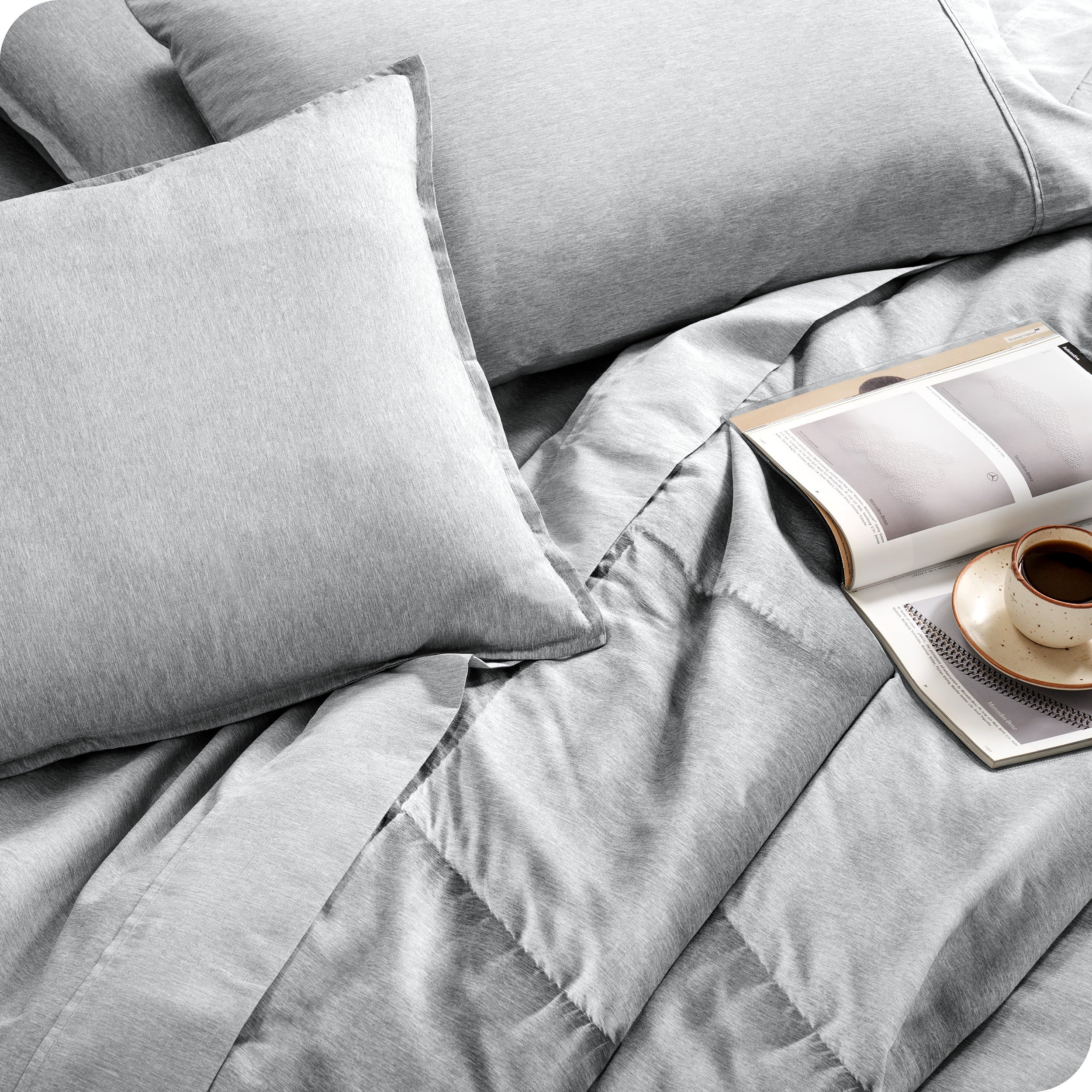 Close of matching sheets, comforter, pillowcases and pillow shams on a bed