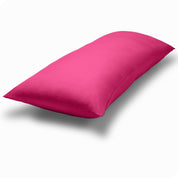A body pillow cover on a pillow on a plain white background