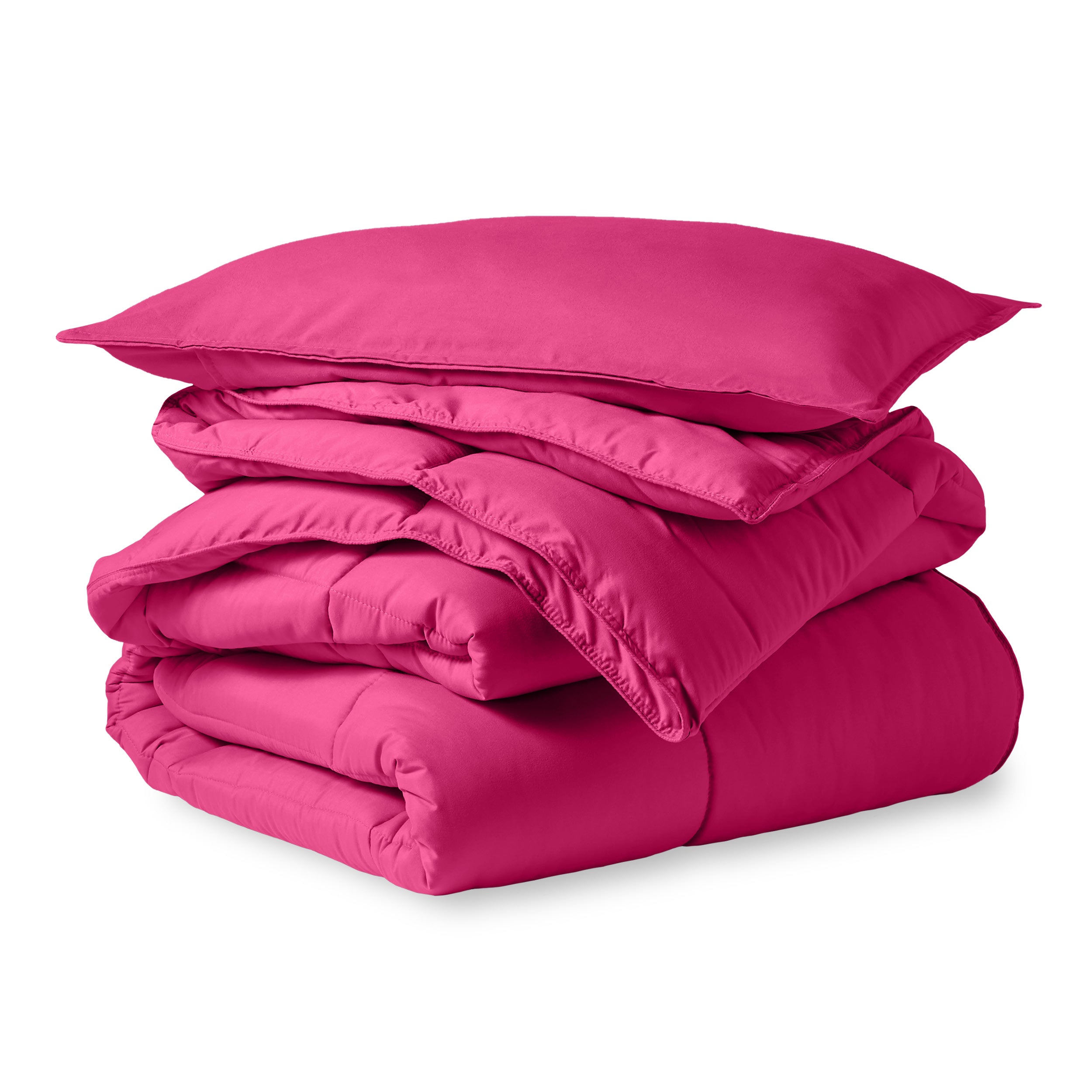 A microfiber comforter folded neatly with a pillow from above