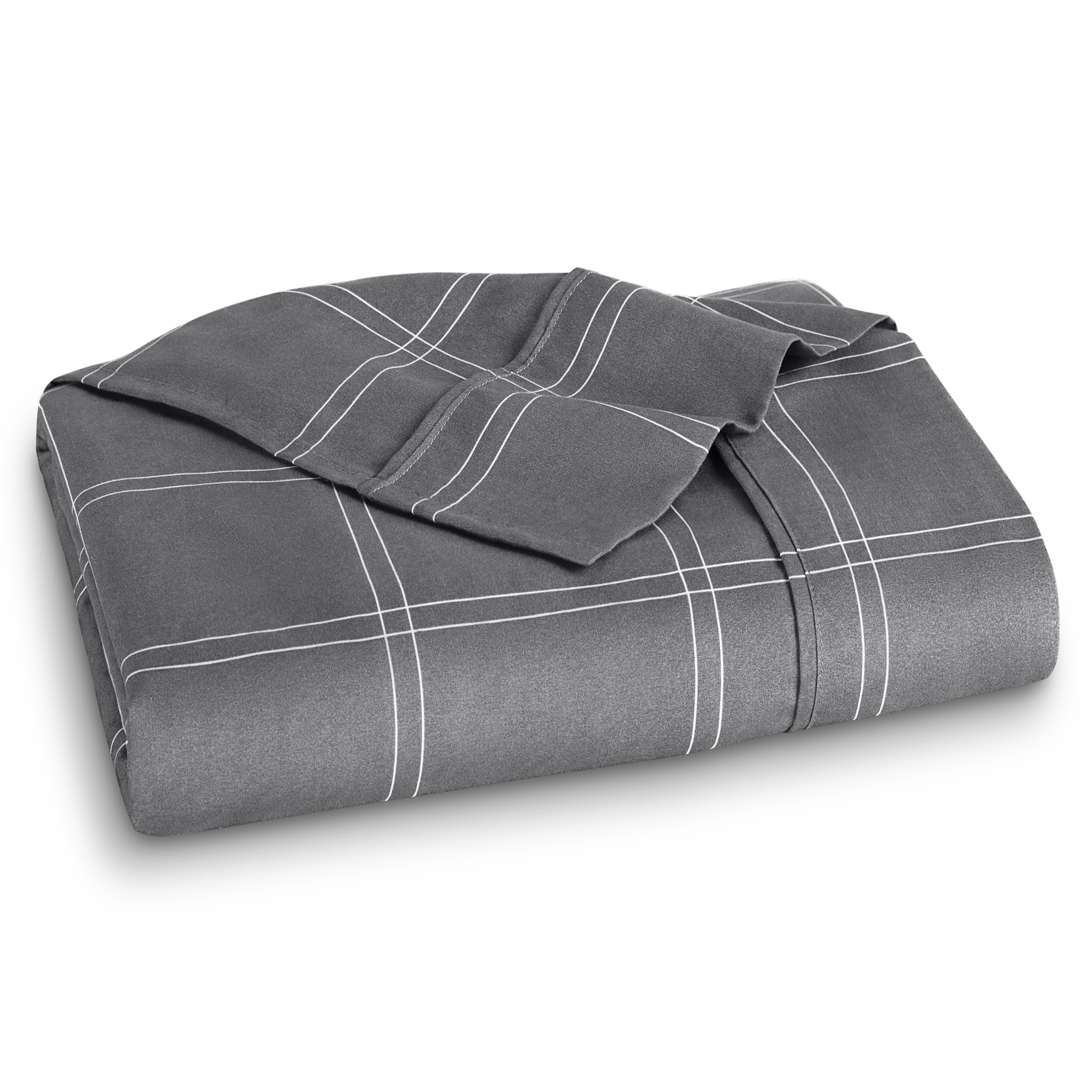 Neatly folded printed microfiber flat sheet with corner folded over. 