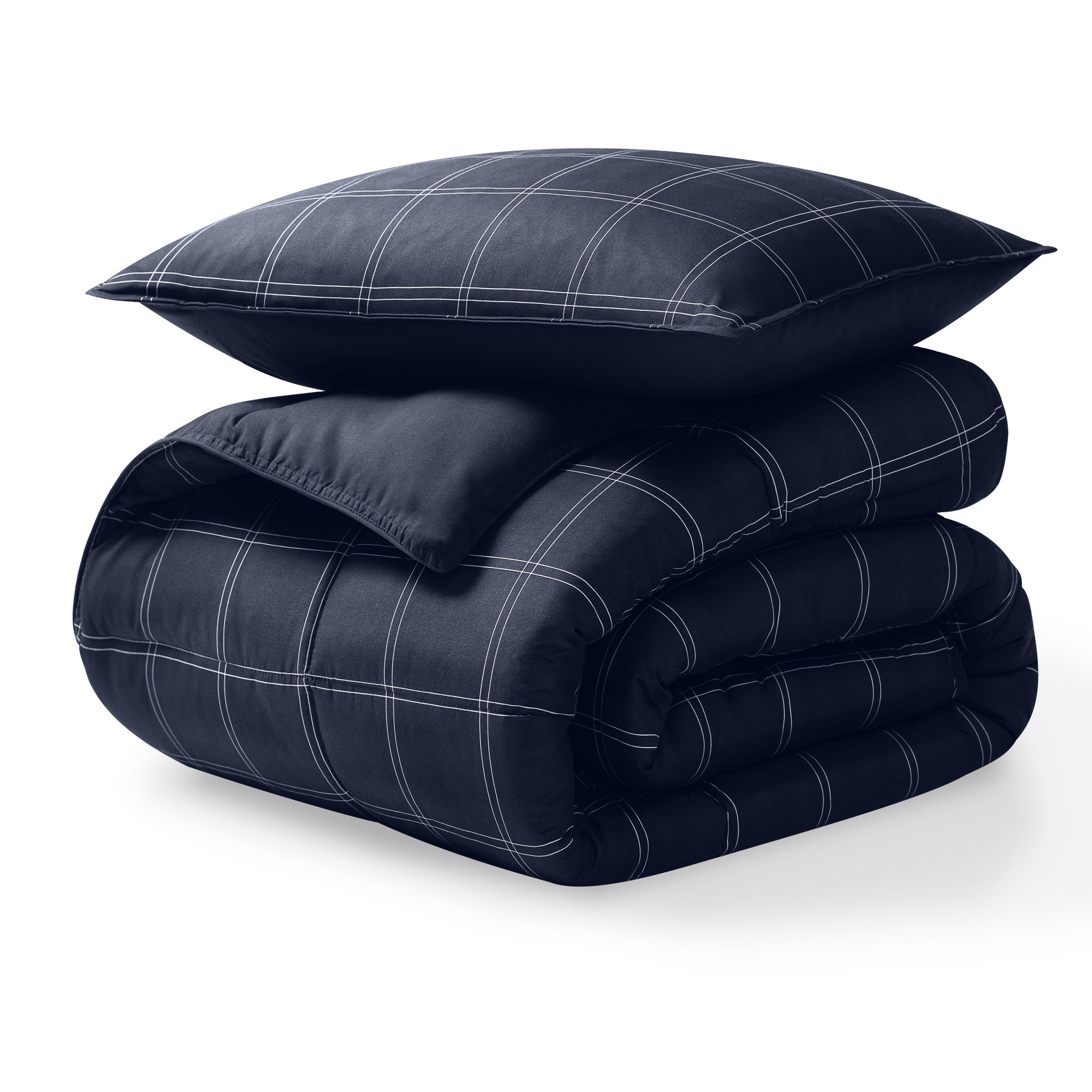 A microfiber comforter folded neatly with a pillow from above