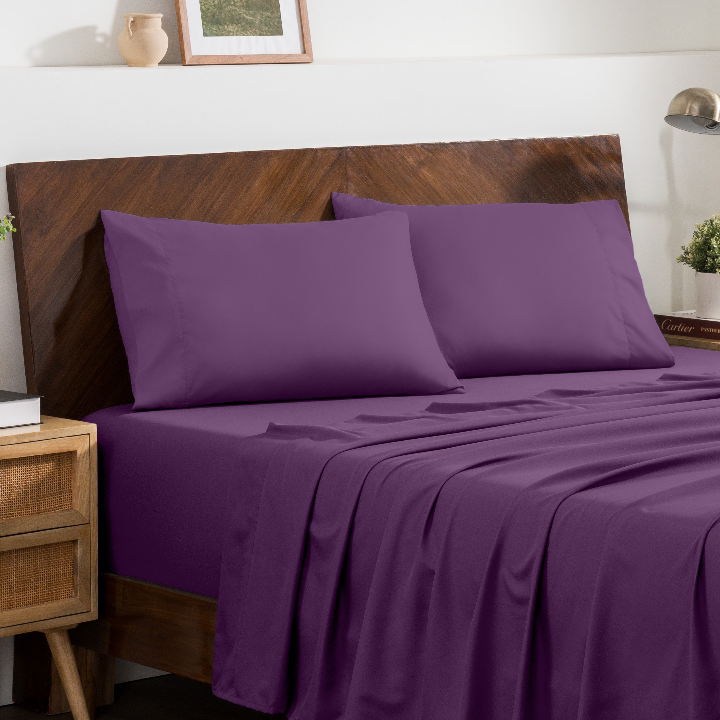 2 pillowcases on pillows on a nicely made bed