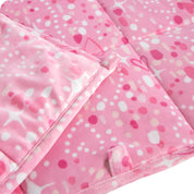 Close-up image of a weighted blanket, featuring detailed stitching and the edge of the blanket