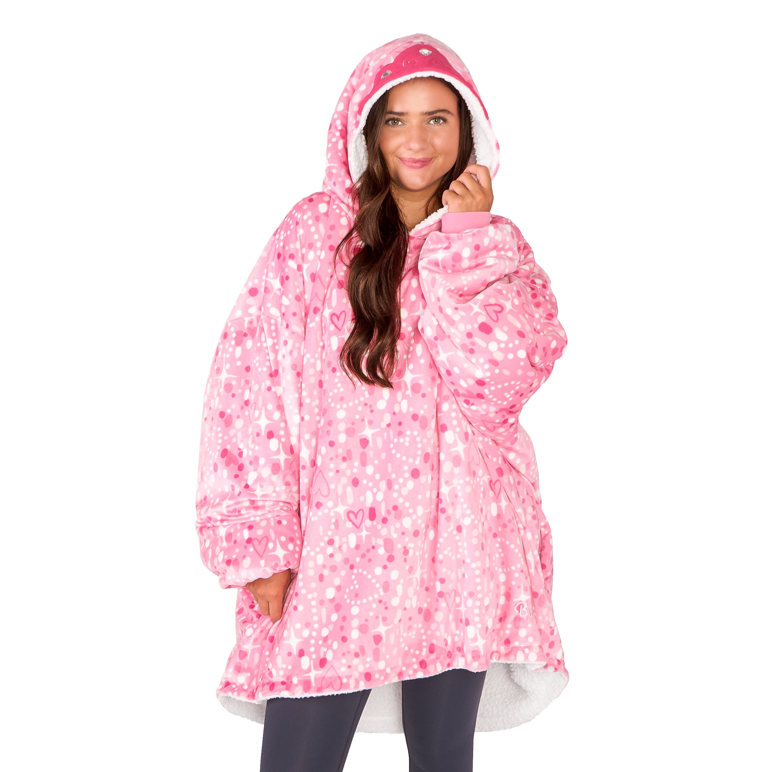 An adult with a sherpa wearable blanket on