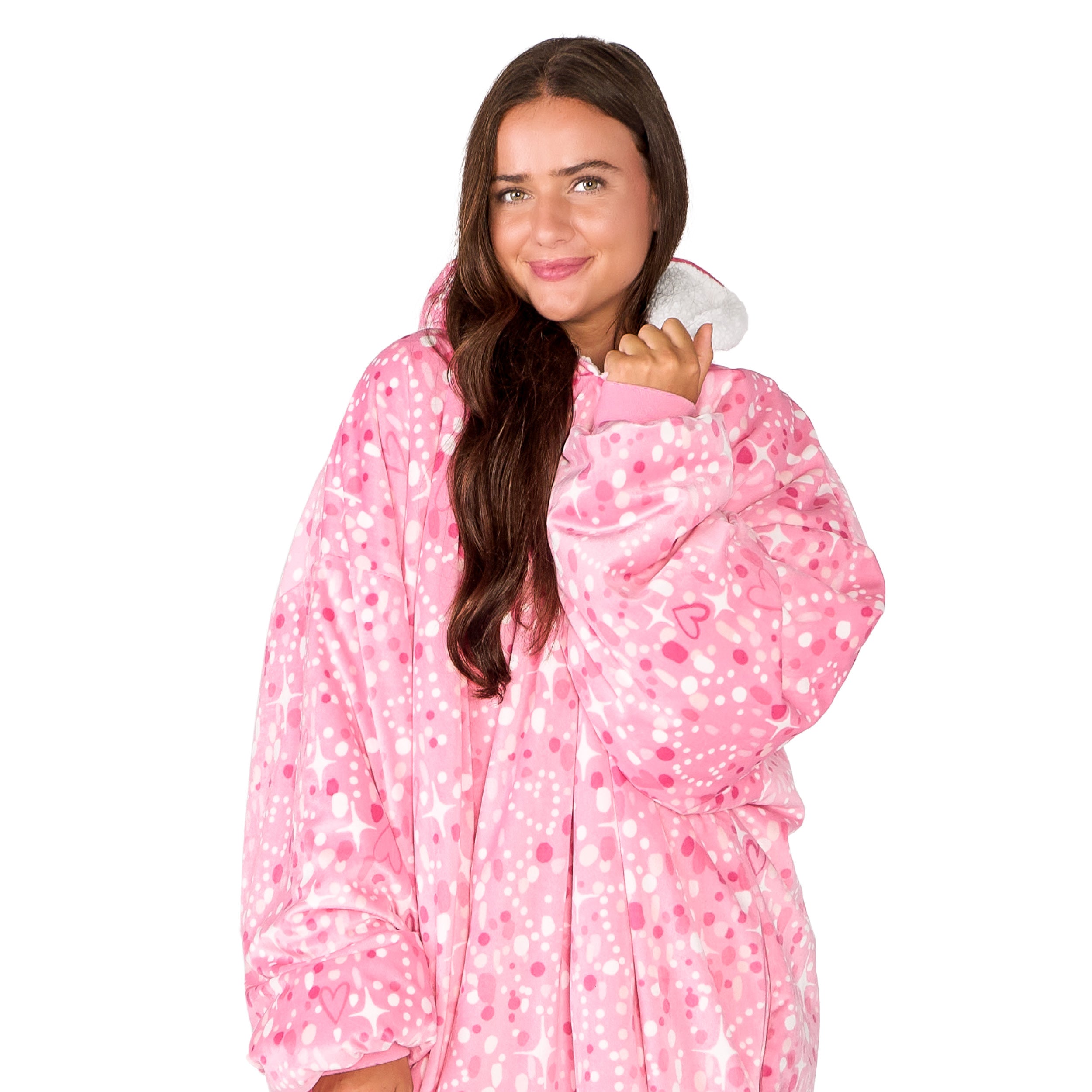 An adult with a sherpa wearable blanket on