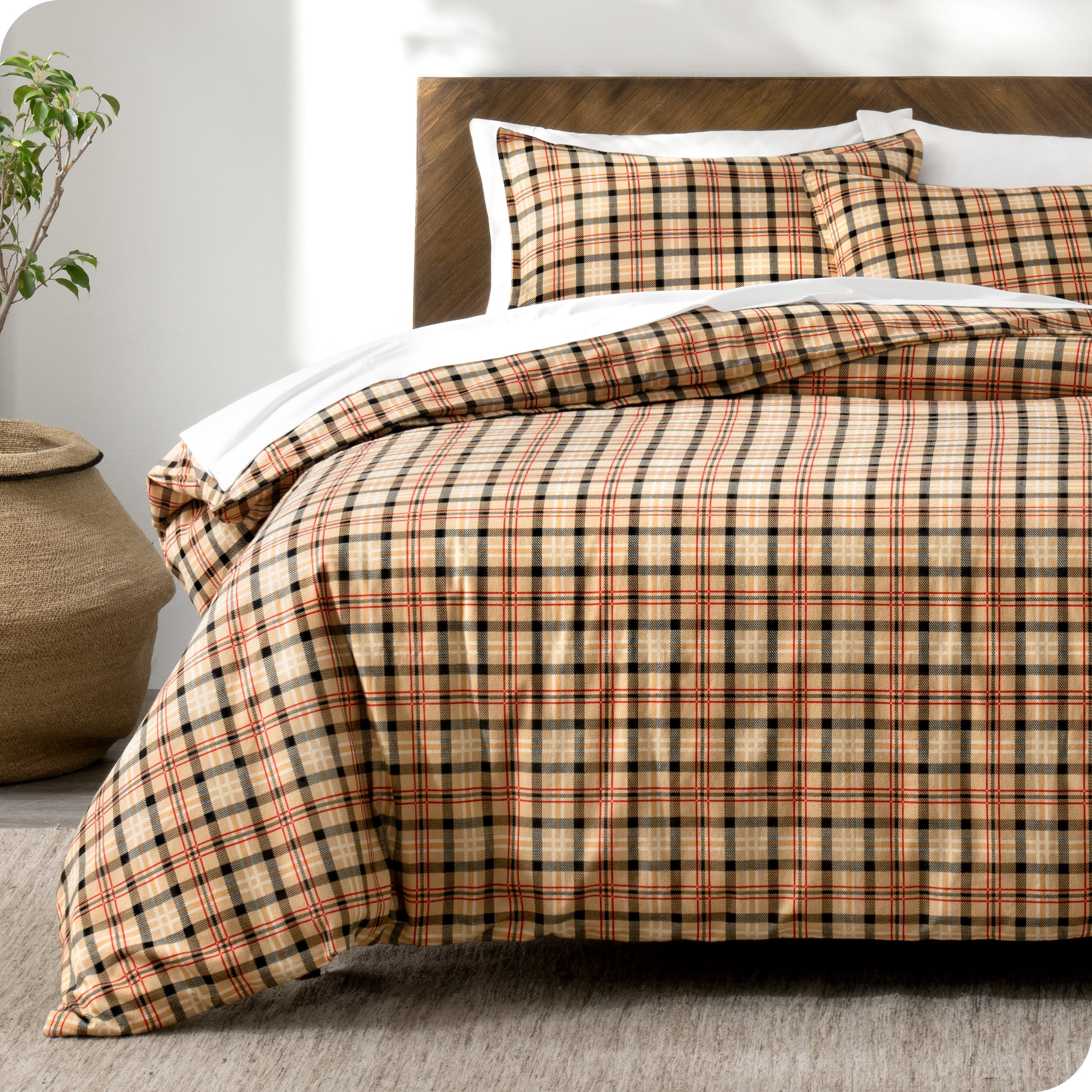 A modern bed with a flannel duvet cover set consisting of the duvet cover and two pillows.