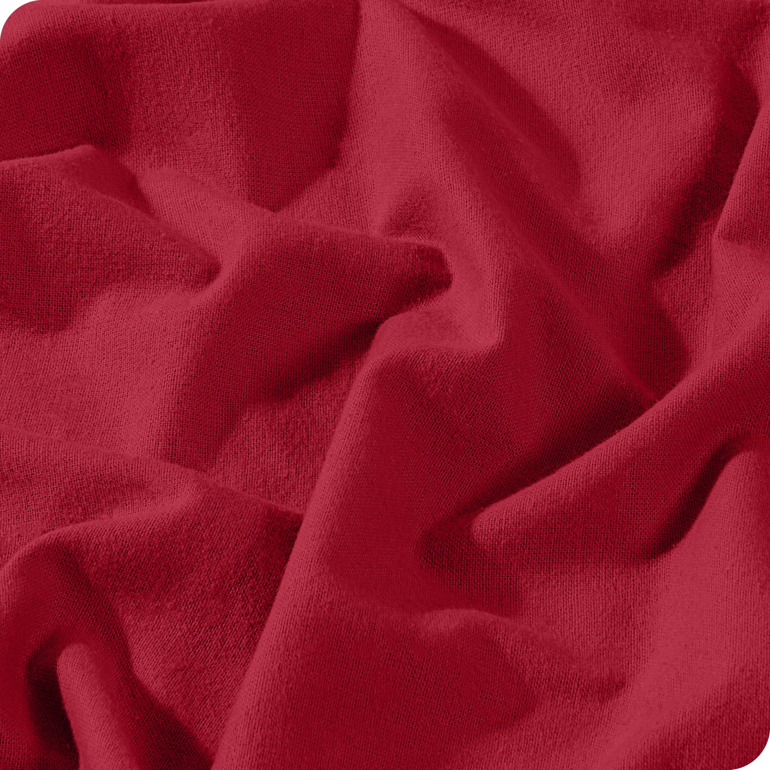 A close view of a button and lining on the flannel duvet cover.