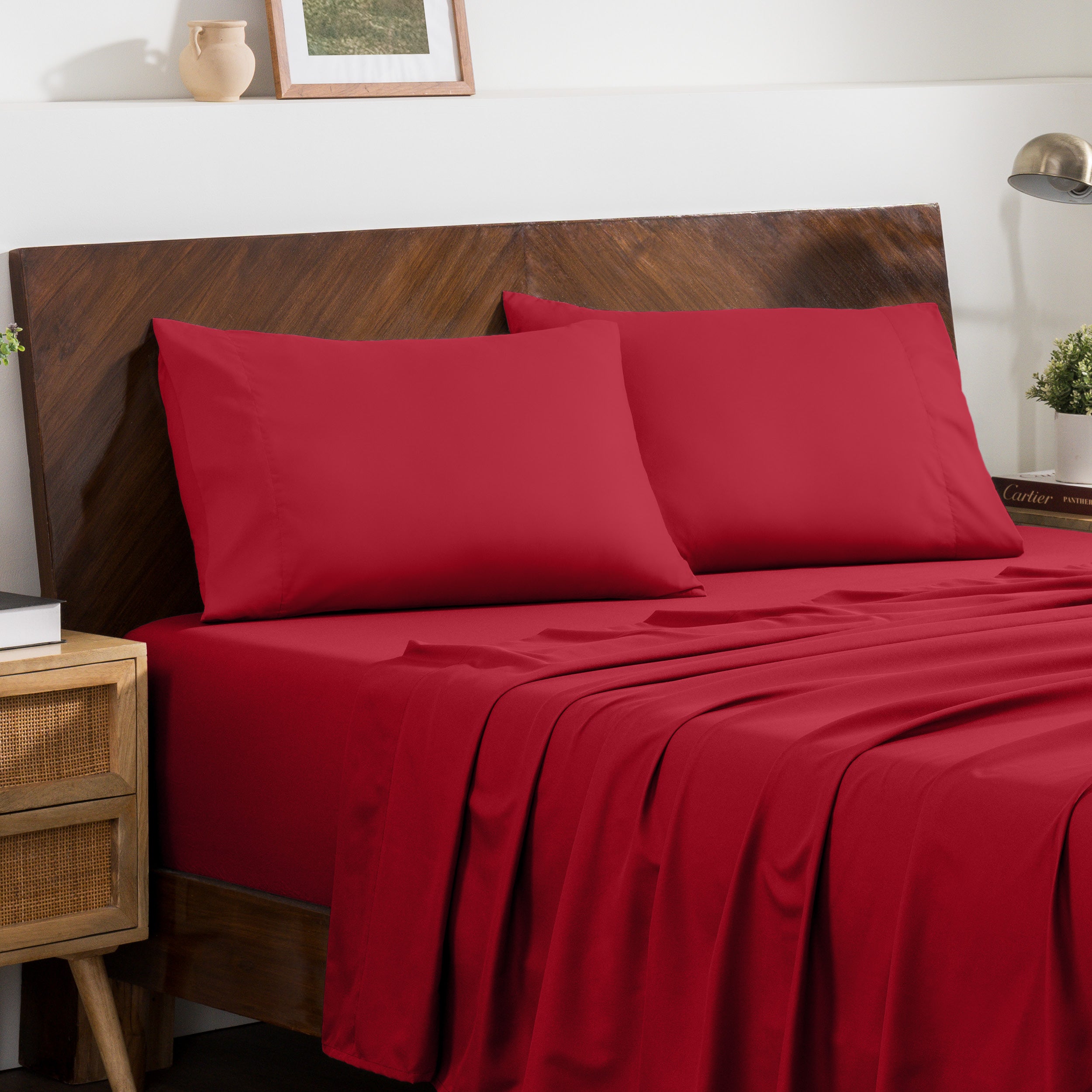 2 pillowcases on pillows on a nicely made bed