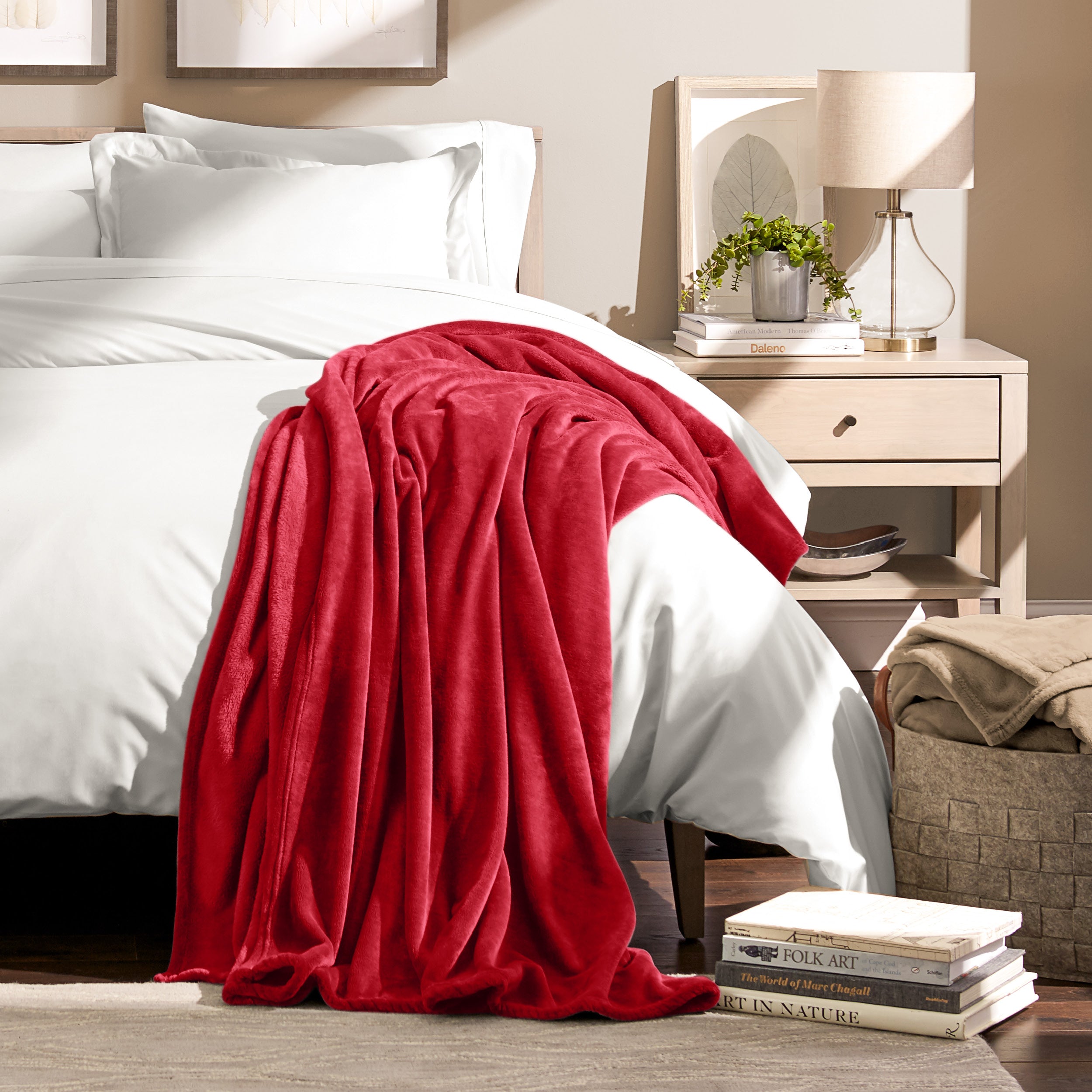 Microplush blanket laid out over a bed and folded back over itself