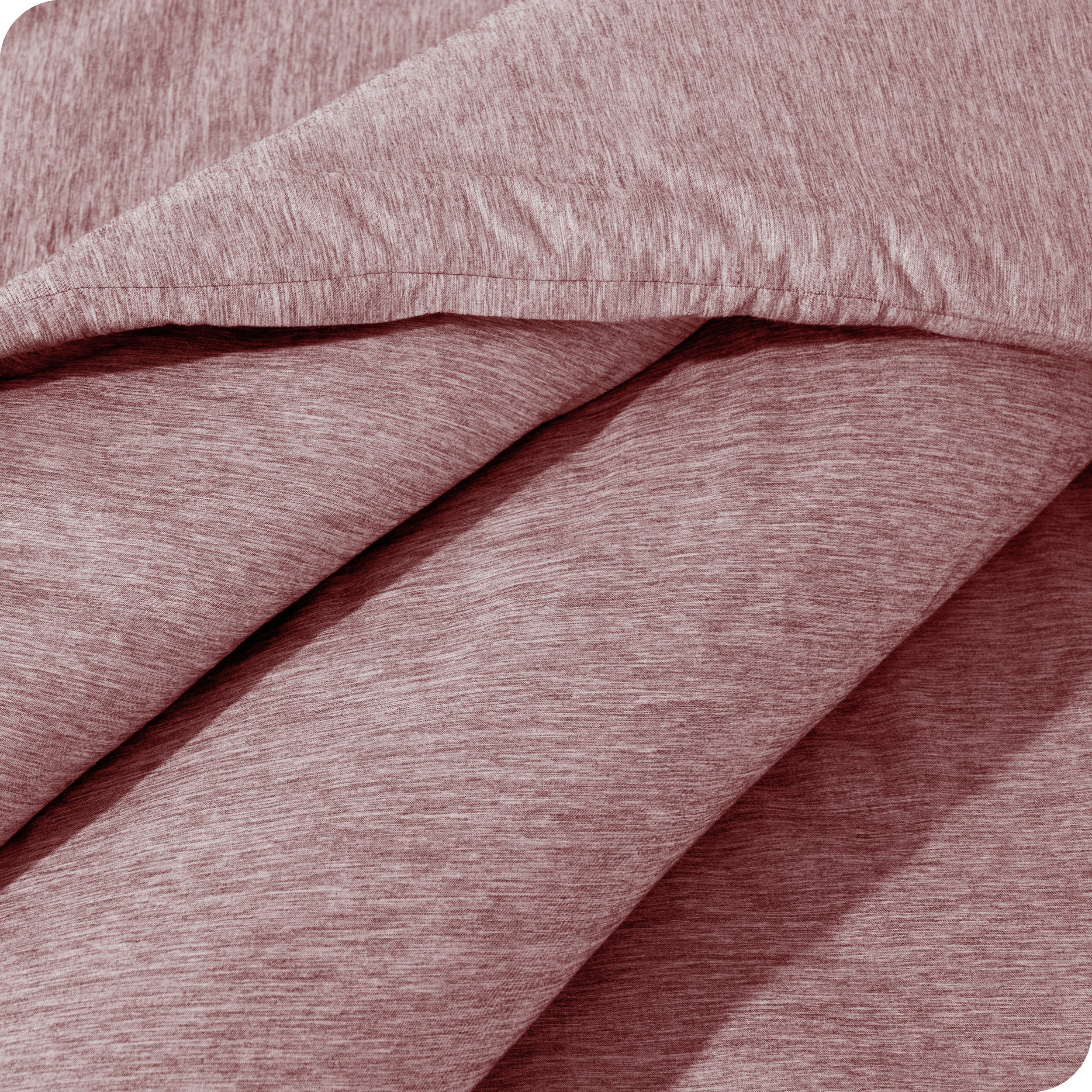 A close up of a corner of the microfiber comforter
