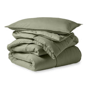 A microfiber comforter folded neatly with a pillow from above